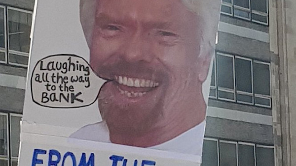 Protect our NHS placard with Branson