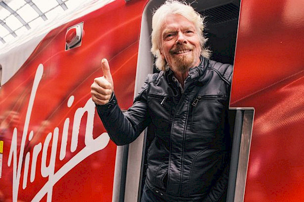 Richard Branson on a Virgin branded train