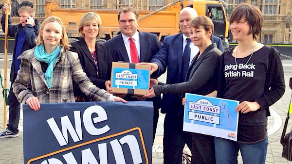 Cat Hobbs, Lilian Greenwood MP, Manual Cortes from TSSA Union, the late Bob Crow from RMT Union, Caroline Lucas MP and Ellie Harrison from Bring Back British Rail outside Parliament in 2013