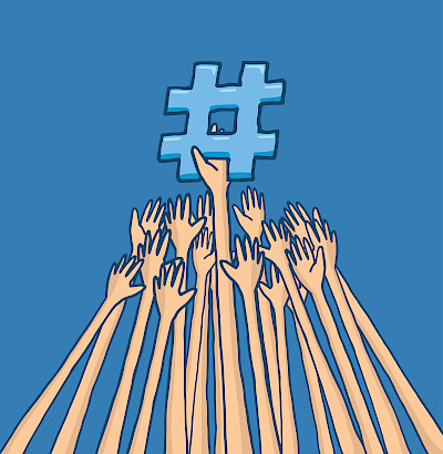 Hands reaching for a hashtag