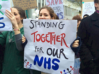 'Standing together for our NHS' banner