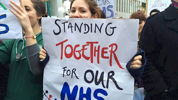 'Standing together for our NHS' banner