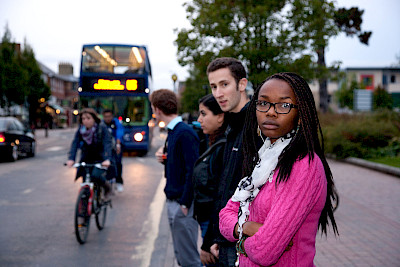 Passengers at a bus stop