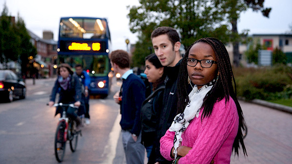 Passengers at a bus stop