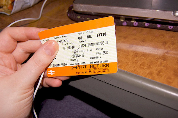 Train ticket in hand