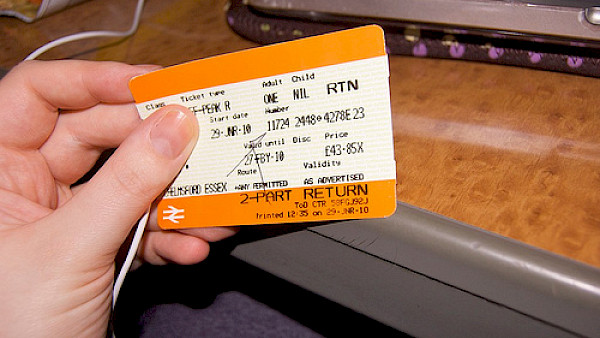 Train ticket in hand