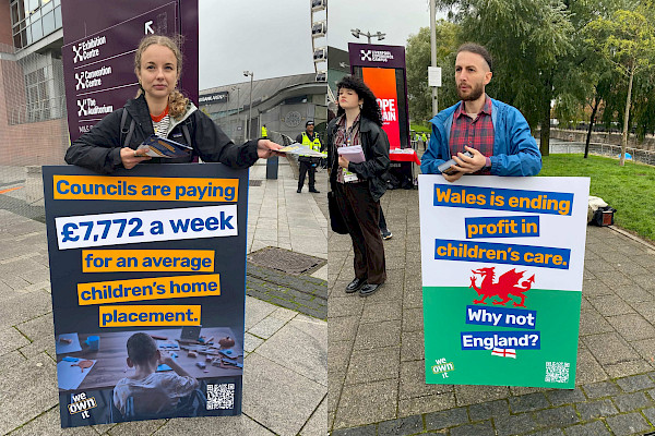 Image of campaigners carrying boards that say "Councils are paying £7772 a week for an average children's home placement" and "Wales is ending profit in children's care. Why not England?"