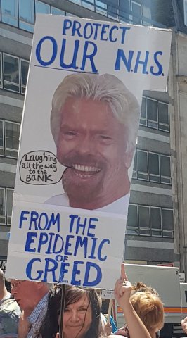 Protect our NHS placard with Branson