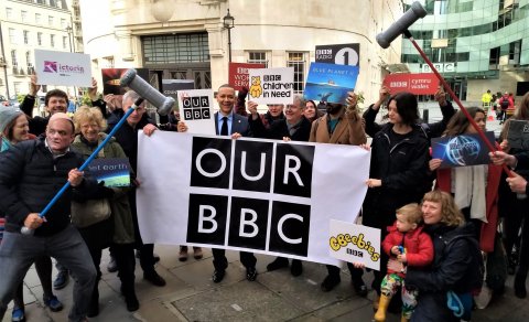 Protesters with banner reading "Our BBC"