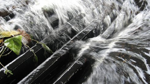 Photo of water down the drain
